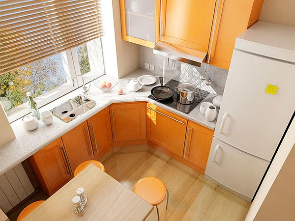 interior de una pequeña cocina con un calentador de agua a gas